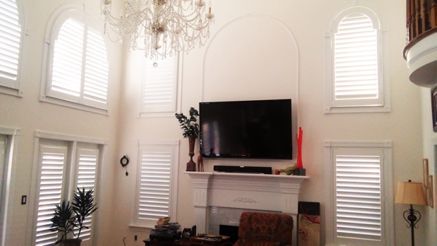 Arched shutters in a great room